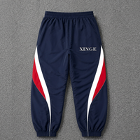 Survêtements personnalisés en gros, ensembles unisexes, survêtements pour hommes coupe ample, ensemble en nylon imperméable, costumes à rayures contrastées pour homme