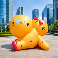 Personnage de dessin animé gonflable géant personnalisé, double chat gonflable mignon orange assis, modèle de chats jumeaux gonflables pour centre commercial