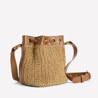 Sac seau en paille naturelle tressée avec cordon de serrage, œillets métalliques décoratifs, sangle en similicuir, sac bandoulière décontracté pour femme, idéal pour les voyages
