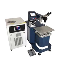 Machine de soudage laser YAG professionnelle 200W 400W pour métaux destinée aux industries de la construction, nécessitant un entretien abrasif
