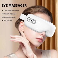 Appareil de massage oculaire portable, masseur oculaire à air chaud et pression d'air pour les voyages et la maison