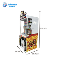 Machine d'arcade de distribution de prix rotative RaiseFun – Jeu de la chance avec distribution de boîtes mystères, collations et cadeaux – Accepte les pièces de monnaie, l'argent liquide et les cartes de crédit