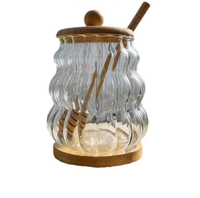 Bocaux de rangement pour la cuisine en verre borosilicate, distributeur de miel, bouteilles transparentes, pots en verre vides pour miel avec couvercles et cuillères.