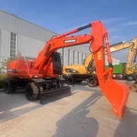 Excavatrice sur pneus hydraulique d'occasion Doosan DH150W-7 avec moteur, boîte de vitesses et pompe