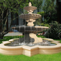 Grande fontaine d'eau classique à plusieurs niveaux en pierre pour jardin extérieur avec sculpture sculptée sur mesure pour la décoration de plaza, de jardin et de projets emblématiques
