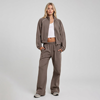 Ensemble de survêtement personnalisé pour femme, veste bomber courte zippée en interlock avec passepoil contrastant et pantalon de jogging large, ensemble 2 pièces