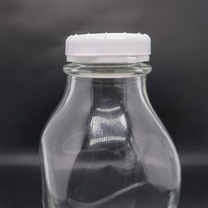 32 ออนซ์ ขวดแก้วใสทรงเหลี่ยมขนาด 1000 มล. <span class=keywords><strong>1</strong></span> ลิตร พร้อมฝาพลาสติกสีขาวแบบล็อคป้องกันการแกะขนาด 48 มม. รุ่น 48-Snap - Product Image 2