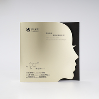 Boîte pliante personnalisée éco-responsable avec découpe de silhouette faciale, estampage à chaud UV or, finition mate pour masque facial aseptique de soin de la peau