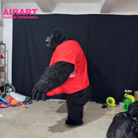 Costume de gorille réaliste en peluche gonflable d'activité de thème de carnaval de cirque en rouge pour le défilé