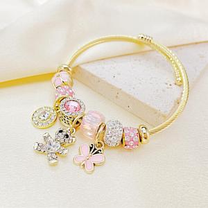 <span class=keywords><strong>Bracelet</strong></span> jonc unisexe <span class=keywords><strong>en</strong></span> acier inoxydable plaqué or 18 carats avec pendentif papillon et ours, orné de cristaux et de perles, pour une mode tendance - Product Image 6