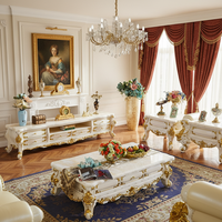 Meuble TV en bois massif de style européen, table basse de luxe en marbre blanc sculpté couleur or champagne, et armoire de sol combinée pour salon