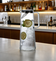 Pichet à eau en verre borosilicate de 1,35 L avec couvercle et filtre |   Carafe à boissons résistante à la chaleur avec poignée pour jus et boissons froides