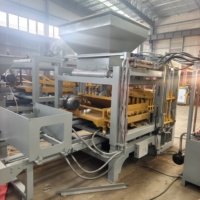 Machine automatique de fabrication de briques en béton QT4-15 pour blocs creux, pavés de jardin et production de briques murales durables