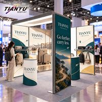 Stand d'exposition modulaire en tissu tendu SEG 3x3 6x6 avec étagères pour événements, système d'alimentation monophasé