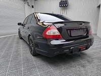 Kit Carrosserie WALD d'Amélioration pour Mercedes-Benz Classe E W211, Incluant Pare-Chocs Avant, Pare-Chocs Arrière, Jupes Latérales et Sortie d'Échappement