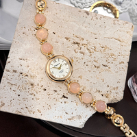 Montre pour femmes élégante et luxueuse avec pierres précieuses, style vintage avec cadran en perles PRO19