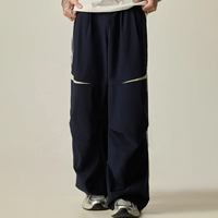 Regenbogen-Spray OEM/ODM Streetwear-Hersteller Herren Seitenstreifen-Fallschirmhose Leichte Baggy-Fallschirm-Sweatpants für Männer