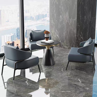 Ensemble de meubles de luxe moderne, fauteuil lounge en cuir PU orange, table ronde en pierre frittée, mobilier commercial pour hôtel
