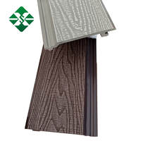 Panneaux muraux en composite plastique WPC à grain de bois gaufré, imperméables, modernes et très demandés pour l'extérieur