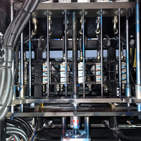 Machine de soufflage de bouteilles en plastique 6 cavités PET 2L à entraînement servo basse consommation 70KW pour contenants d'eau, de jus et de détergent, personnalisable OEM