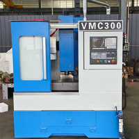 Centre d'usinage vertical CNC 3 axes VMC300, machine de fraisage de métaux à haute vitesse pour un travail des métaux de précision