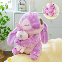 Nouvelle peluche Stitch Sakura, adorable peluche douce de dessin animé, Stitch violet tenant un petit monstre, peluche Stitch en velours, jouets en peluche