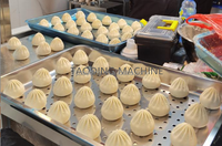 Machine entièrement automatique pour la fabrication de Xiao Long Bao, Momo, Mochi, Baozi, Kibbeh et Kubba