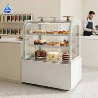 Vitrine à desserts en verre courbé sur mesure, base blanche, vitrine réfrigérée pour pâtisserie, boulangerie, café, hôtel