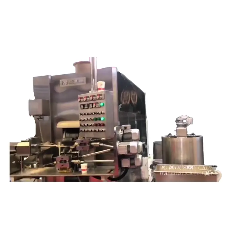 Machine de fabrication de rouleaux d'oeufs en bâton de gaufrette Shanghai HG de haute qualité à bas prix pour machines à snacks