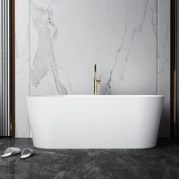 Baignoire ovale autoportante moderne en surface solide, blanc mat, en pierre artificielle, avec accessoires complets