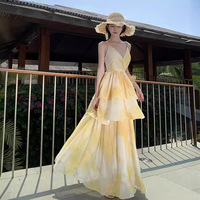 Robe longue à bretelles spaghetti, taille naturelle, à volants, motif floral, style streetwear mignon et élégant pour femme, idéale pour les vacances d'été à la plage