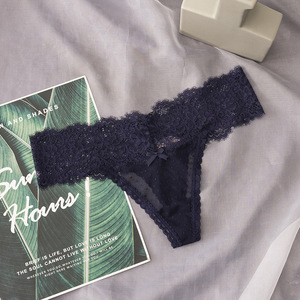 Tanga de encaje para mujer al por mayor, con lazo decorativo, lunares, tiro bajo, sexy, ultrafina, transparente, ropa interior íntima para mujer - Product Image 1