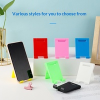Nouveau support de téléphone de bureau en plastique mignon, style épuré, support réglable et pliable pour téléphone et tablette, disponible en gros en Chine
