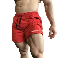 Logo personalizzato mens gym wear uomo in esecuzione allenamento estivo asciugatura rapida qualità fitness pantaloncini in nylon personalizzati