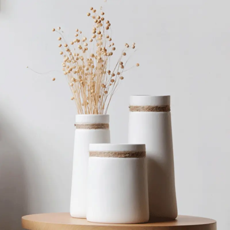 卸売シンプルな白いセラミック磁器花瓶家の装飾工芸品用ロープ付き花瓶