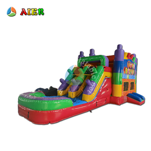 Château gonflable coloré et amusant pour fêtes, avec toboggan intégré - Product Image 1