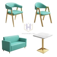 Vente chaude en cuir avec 2 chaises Table en métal et pieds de chaise Meubles de magasin de café de loisirs