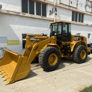 Promotion : Chargeuse sur pneus d'occasion Caterpillar CAT966H japonaise, moteur 194 kW, pour usage agricole, avec rétrocaveuse intégrée - Product Image 1