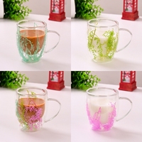 Vente en gros de tasses en verre à double paroi en borosilicate de haute qualité, résistantes à la chaleur, avec fleurs séchées