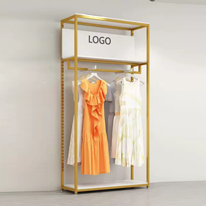 Nhà Sản Xuất Bán Buôn Quần Áo Kim Loại May Mặc Giá Thép Không Gỉ Biểu Tượng Tùy Chỉnh Hiển Thị Đứng Quần Áo Vàng Hiển Thị Giá Và Kệ - Product Image 1