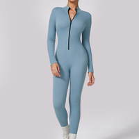 Combinaison côtelée personnalisée OEM pour femme, col montant, fermeture éclair, manches longues, longueur intégrale, séchage rapide, respirante, ajustée, pour yoga et gym