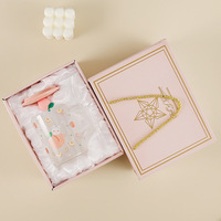 Verres en verre Coffret cadeau Tasse en verre à eau Cuillère à couvercle souvenir Conception élégante de tasse pour un usage quotidien ou des occasions spéciales
