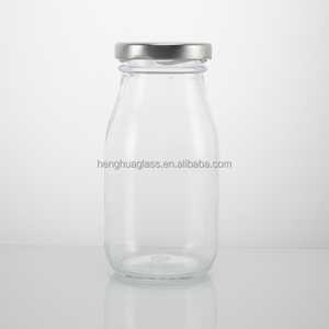 Wholesale 150ml <strong>200ml</strong> 250ml 500ml Round Glass <strong>Milk</strong> Bottles Empty Clear Fruit Juice Glass Bottle with Metal Lids - Product Image 5