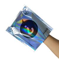 Sac d'emballage cadeau surprise coloré personnalisé PVC vide point d'interrogation film laser sac aveugle avec motif imprimé
