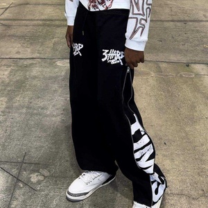 Pantalons de survêtement sportifs surdimensionnés en coton de haute qualité pour hommes, avec impression de logo personnalisé et fermeture éclair latérale, style streetwear - Product Image 1