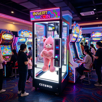 Machine de coupe de jouets commerciale à retour sur investissement élevé pour salles de jeux, avec vitrine entièrement transparente et écran intégré