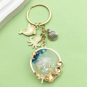 Hot Bán Nhỏ Kim Loại Hợp Kim Vỏ Keychain Ba Lô Mặt Dây Chuyền Màu Xanh Dầu Thả Cá Heo Bạch Tuộc Thiết Kế Làm Chất Lượng Cao - Product Image 3