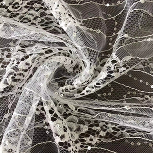 Approvisionnement d'usine Ivoire Chantilly Dentelle Tissu Floristique Paillettes Doublure pour Robes De Mariée - Product Image 1