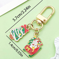 Porte-clés créatif de Noël avec effet d'huile coulante, design de dessin animé mignon, cadeau festif pour enfants et adultes