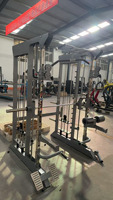 Système de poulie à câbles multiples à usage commercial Cage d'alimentation à squat Smith Machine Power rack tout en un entraîneur multifonctionnel